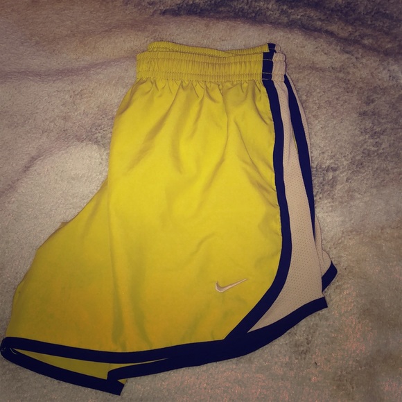 yellow and white nike shorts
